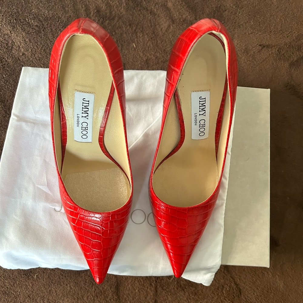 Jimmy Choo red leather embossed pumps, size 38 EUR, 8 USA.